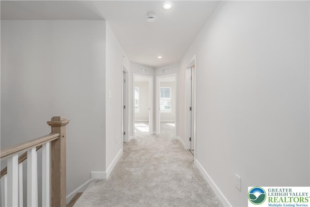 1022 Watson Ct, Upper Macungie Twp, PA 18051 - hallway featuring light carpet, recessed lighting, baseboards, and an upstairs landing