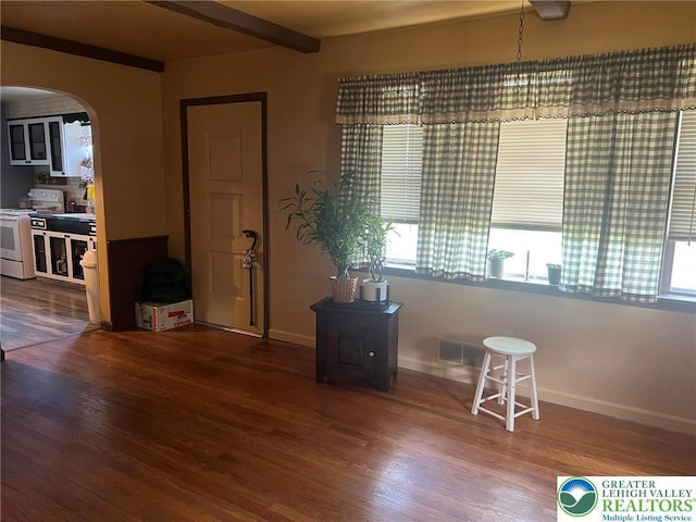 3426 Wilson Ave, South Whitehall Twp, PA 18069 - entryway featuring beam ceiling, arched walkways, baseboards, and wood finished floors