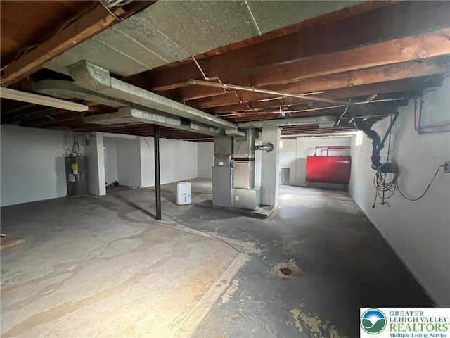 3426 Wilson Ave, South Whitehall Twp, PA 18069 - unfinished basement with heating fuel, heating unit, and electric water heater