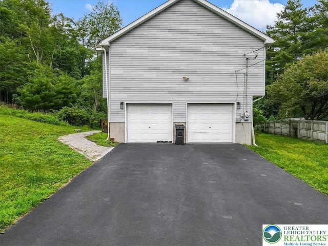 838 Cayuga Way, Stroud Twp, PA 18360 - view of side of home featuring asphalt driveway and an attached garage