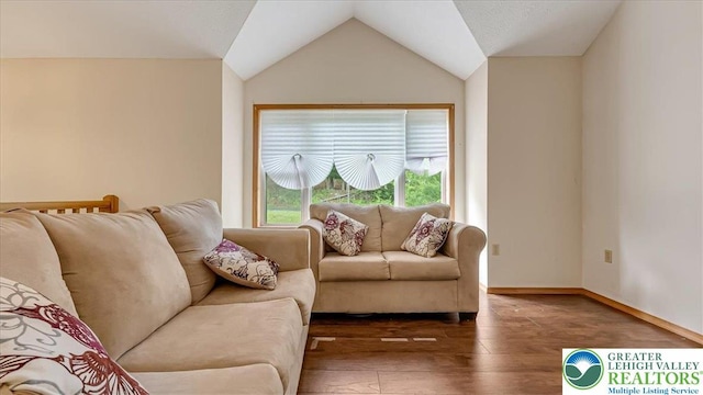 838 Cayuga Way, Stroud Twp, PA 18360 - living area featuring hardwood / wood-style floors and lofted ceiling