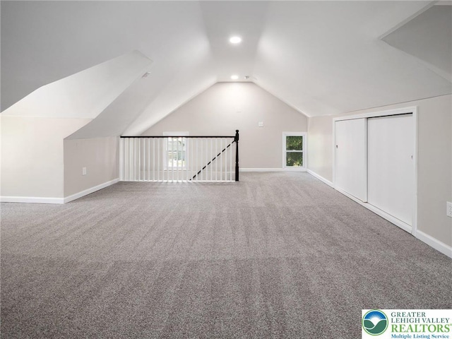 bonus room with carpet, baseboards, lofted ceiling, and recessed lighting