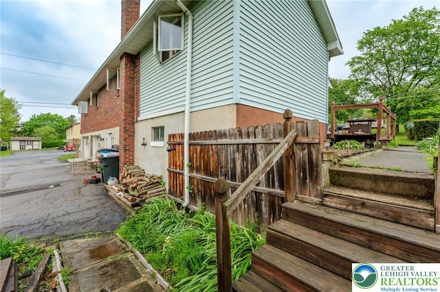 1804 Long Run Rd, Pa, PA 17972 - exterior space with a chimney and fence