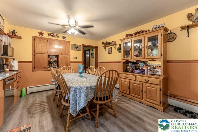 1804 Long Run Rd, Pa, PA 17972 - dining room with a ceiling fan, light wood-style flooring, and a baseboard radiator