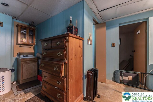 1804 Long Run Rd, Pa, PA 17972 - interior space featuring radiator, concrete floors, and a paneled ceiling