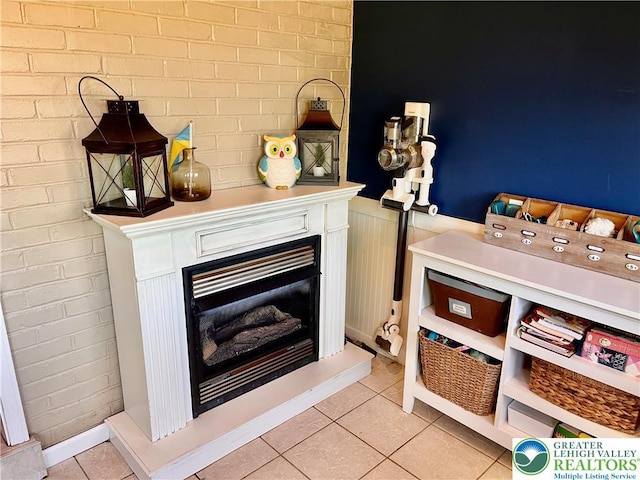 detailed view of a fireplace with raised hearth and wainscoting