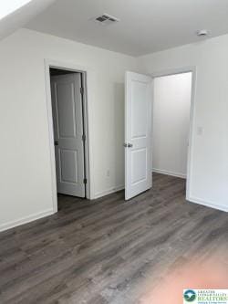 419 W Lincoln, Easton, PA 18042 - unfurnished bedroom with baseboards, visible vents, and wood finished floors