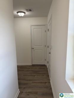 419 W Lincoln, Easton, PA 18042 - hall with dark wood-style flooring, baseboards, and visible vents