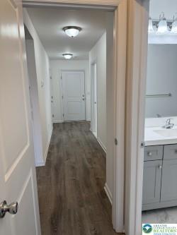 419 W Lincoln, Easton, PA 18042 - corridor with a sink and wood finished floors