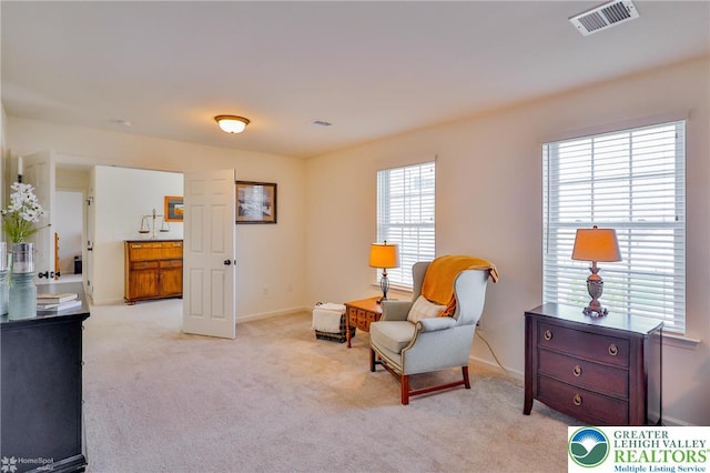 3318 Highland Dr, Palmer Twp, PA 18045 - living area featuring light carpet and baseboards