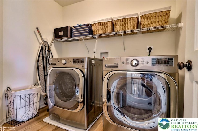 3318 Highland Dr, Palmer Twp, PA 18045 - laundry room featuring washing machine and dryer and wood finished floors