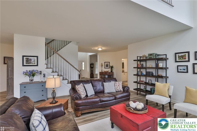3318 Highland Dr, Palmer Twp, PA 18045 - living room featuring wood finished floors and stairs