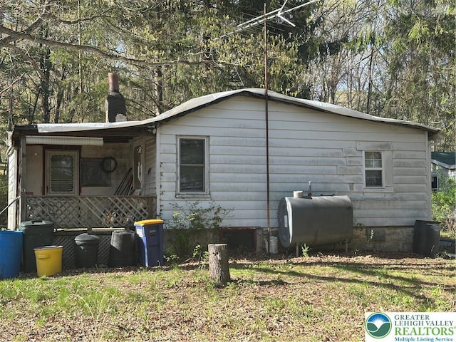 9 School St, Ryan Township, PA 18214 - view of side of home featuring oil tank and crawl space