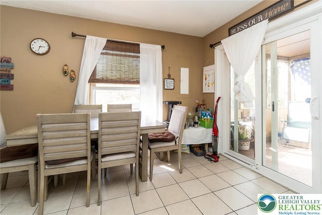 1231 Kensington Dr, Stroud Twp, PA 18301 - dining space featuring light tile patterned floors
