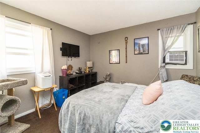 1231 Kensington Dr, Stroud Twp, PA 18301 - bedroom with baseboards, dark carpet, and cooling unit