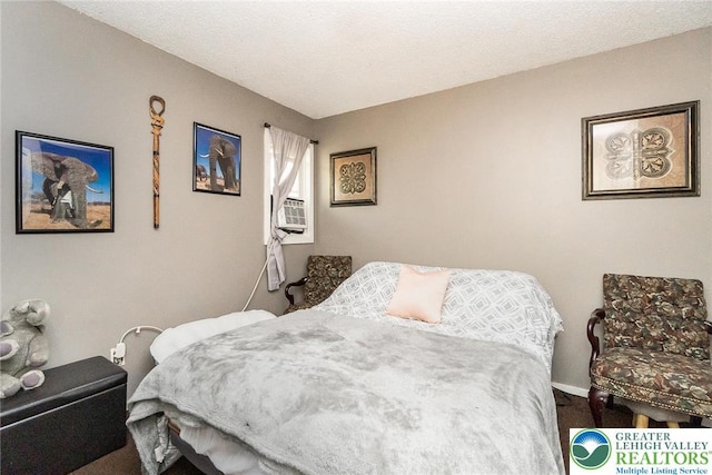 1231 Kensington Dr, Stroud Twp, PA 18301 - bedroom with baseboards and cooling unit