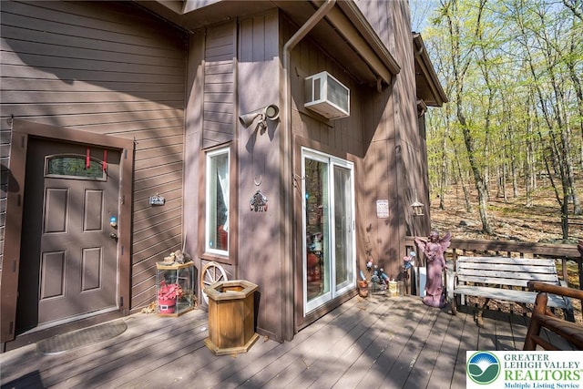 1231 Kensington Dr, Stroud Twp, PA 18301 - exterior space with a deck and an AC wall unit