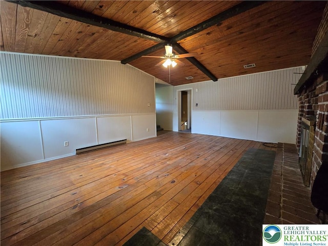 bonus room featuring a ceiling fan, hardwood / wood-style floors, vaulted ceiling with beams, visible vents, and baseboard heating
