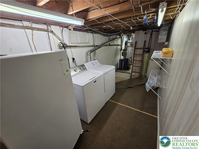 washroom featuring laundry area and independent washer and dryer