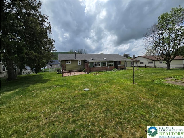 view of yard with fence