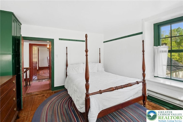 8043 Richlandtown Rd, East Rockhill Twp, PA 18951 - bedroom featuring a baseboard heating unit and wood finished floors