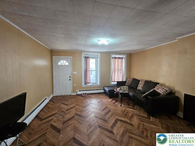 219 N Fountain St, Allentown City, PA 18102 - living room featuring baseboard heating, ornamental molding, and baseboards