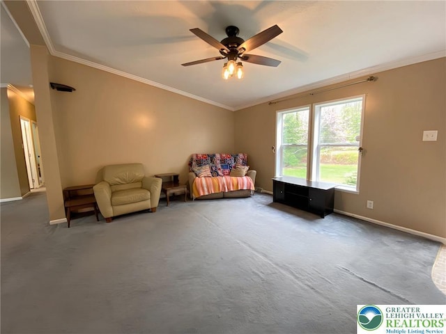 carpeted bedroom featuring crown molding, baseboards, and a ceiling fan