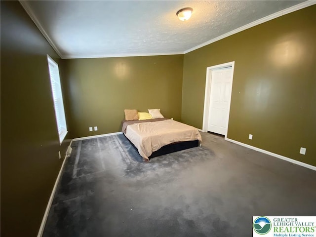 bedroom with baseboards, ornamental molding, carpet floors, and a textured ceiling