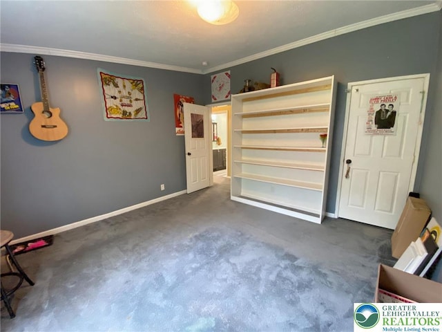 unfurnished bedroom with carpet, ornamental molding, and baseboards