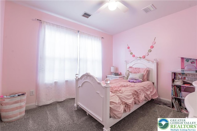 bedroom with baseboards and a ceiling fan