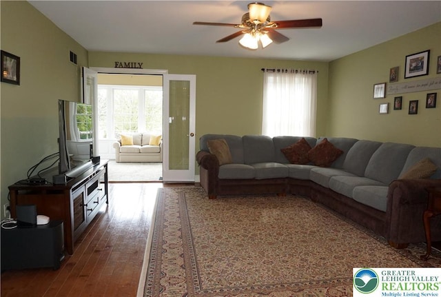 6115 Timberknoll Dr, Lower Macungie Twp, PA 18062 - living room featuring healthy amount of natural light, ceiling fan, and wood finished floors