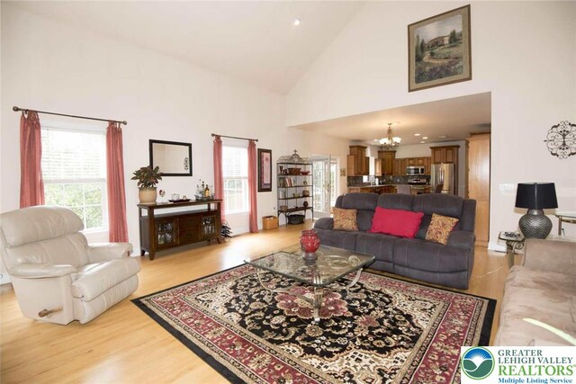 2690 Greens Dr, Lower Saucon Twp, PA 18055 - living area featuring a chandelier, light wood-style flooring, high vaulted ceiling, and recessed lighting