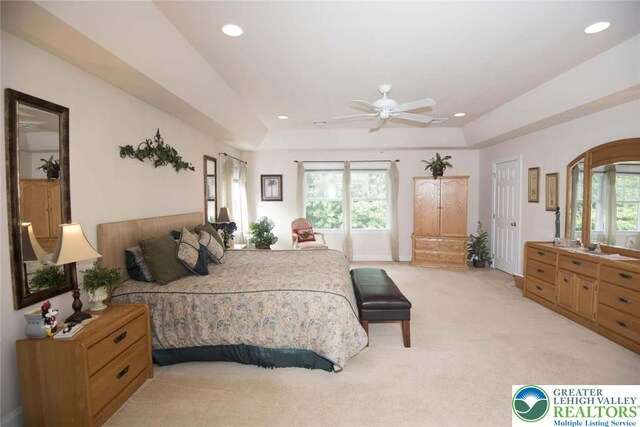 2690 Greens Dr, Lower Saucon Twp, PA 18055 - bedroom with light colored carpet, recessed lighting, a tray ceiling, and ceiling fan