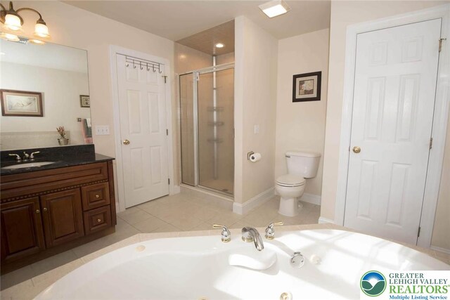 2690 Greens Dr, Lower Saucon Twp, PA 18055 - bathroom featuring a shower stall, toilet, a whirlpool tub, vanity, and tile patterned flooring