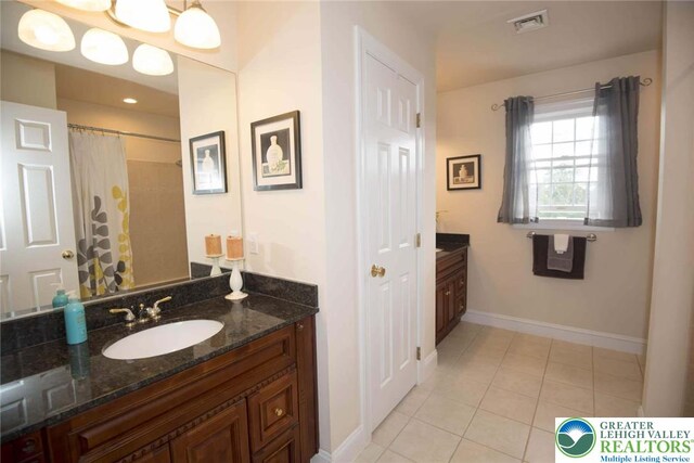 2690 Greens Dr, Lower Saucon Twp, PA 18055 - full bath featuring tile patterned floors, vanity, baseboards, and a shower with shower curtain