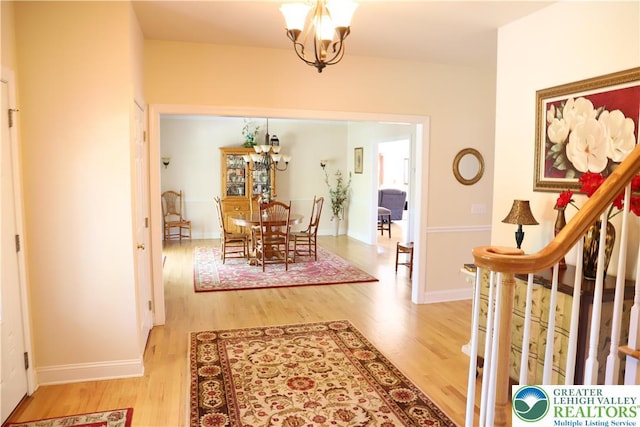 2690 Greens Dr, Lower Saucon Twp, PA 18055 - foyer entrance with a chandelier, wood finished floors, and baseboards