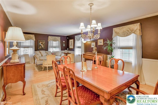 1245 Valley View Dr, Lower Macungie Twp, PA 18103 - dining area featuring a chandelier, wood finished floors, and ornamental molding