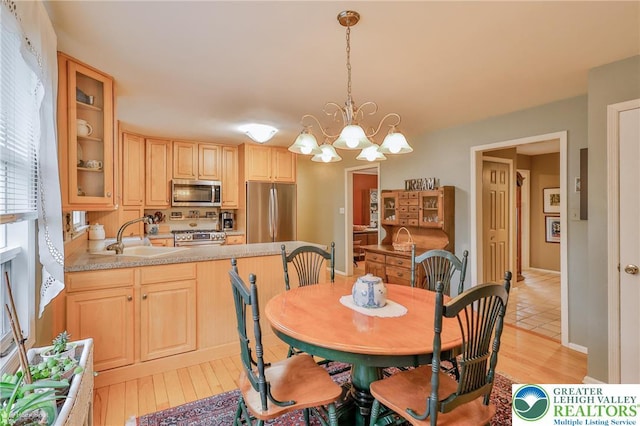 1245 Valley View Dr, Lower Macungie Twp, PA 18103 - dining area featuring light wood finished floors and a chandelier