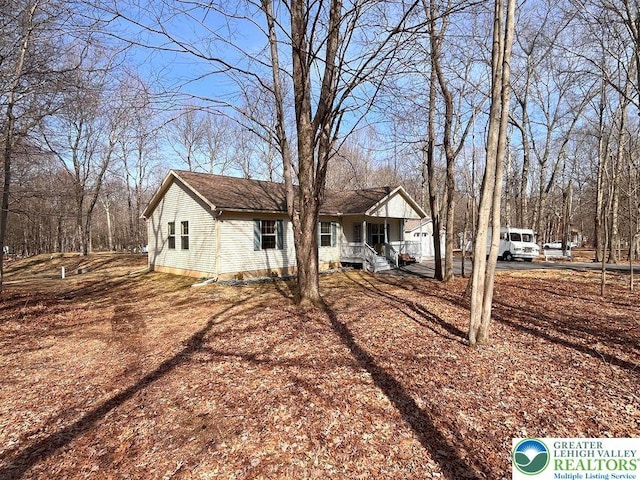ranch-style home with covered porch