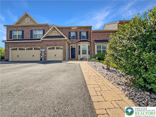 4527 Bellflower Way, Upper Macungie Twp, PA 18104 - view of front of house featuring brick siding, asphalt driveway, and a garage