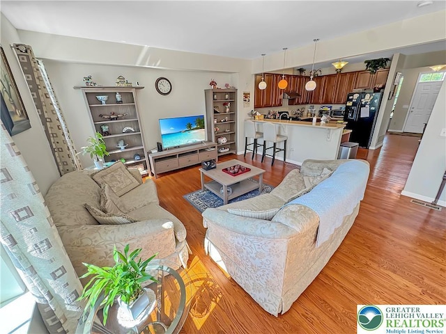 4527 Bellflower Way, Upper Macungie Twp, PA 18104 - living area featuring light wood-type flooring