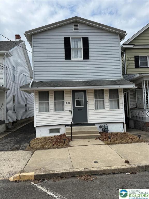 view of front of property with entry steps
