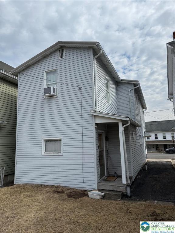 view of home's exterior featuring cooling unit