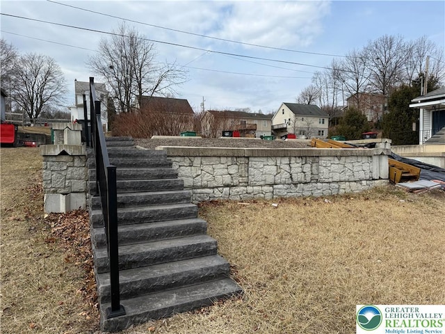 view of yard featuring stairs