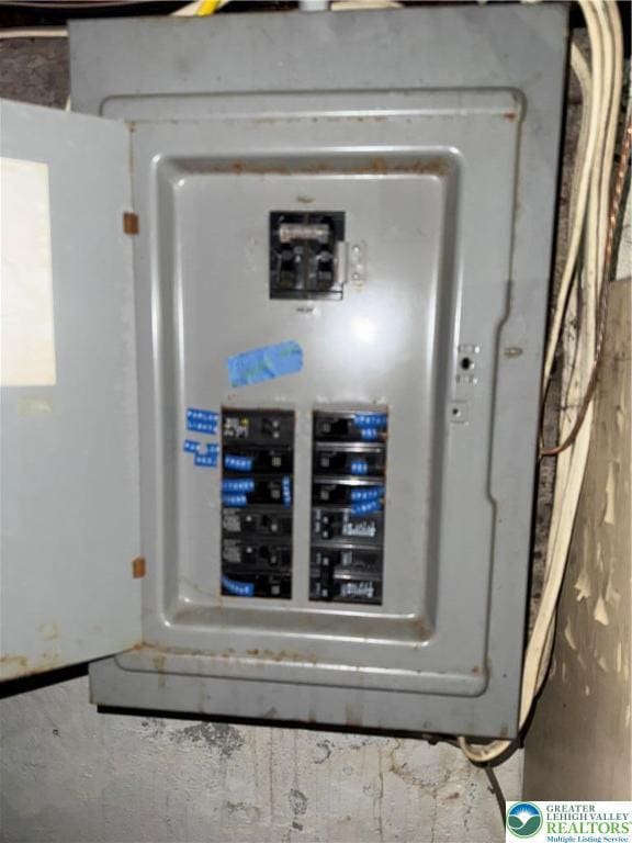 utility room featuring electric panel