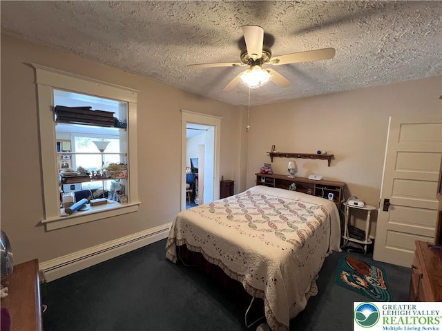 carpeted bedroom with baseboard heating, a textured ceiling, and ceiling fan