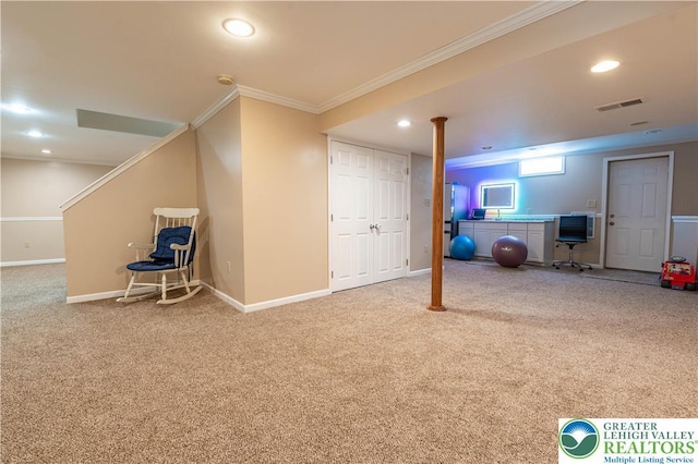 below grade area with ornamental molding, carpet floors, baseboards, recessed lighting, and freestanding refrigerator