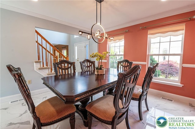dining room featuring light marble finish floors, baseboards, stairs, ornamental molding, and a chandelier