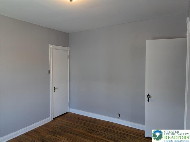 1616 W Tilghman St, Allentown City, PA 18102 - spare room featuring dark wood-style floors and baseboards