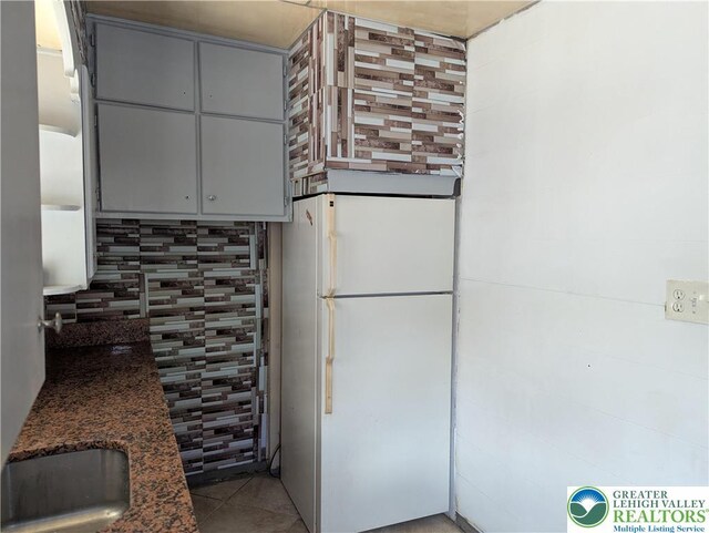 1616 W Tilghman St, Allentown City, PA 18102 - kitchen with freestanding refrigerator, gray cabinets, and tasteful backsplash